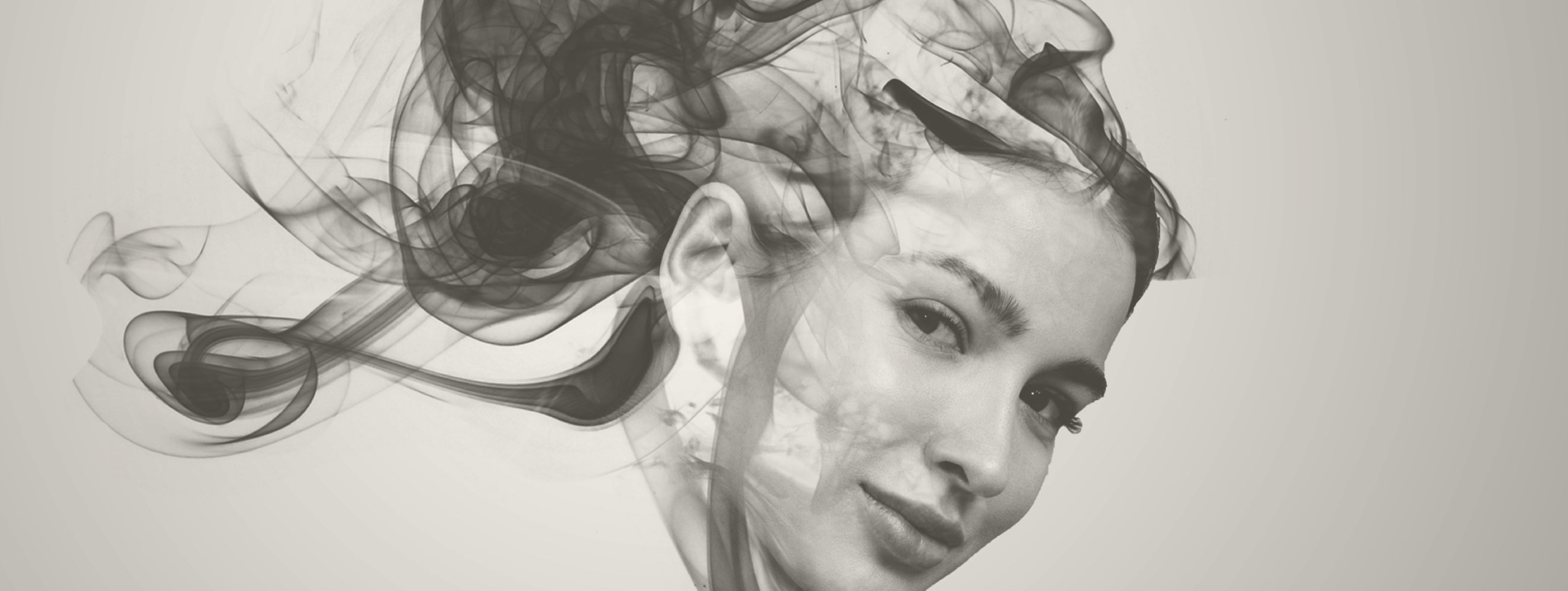 Black and white artistic portrait with abstract elements