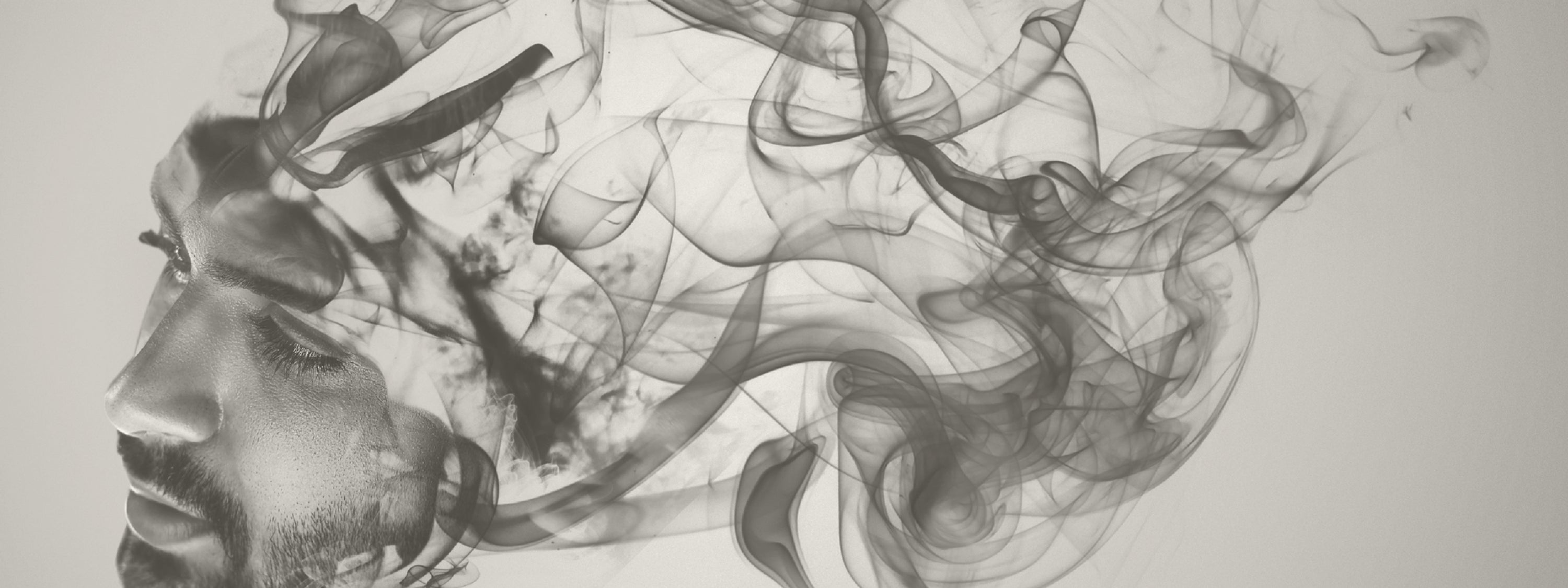 Black and white abstract art with smoke-like shapes on a light gray background