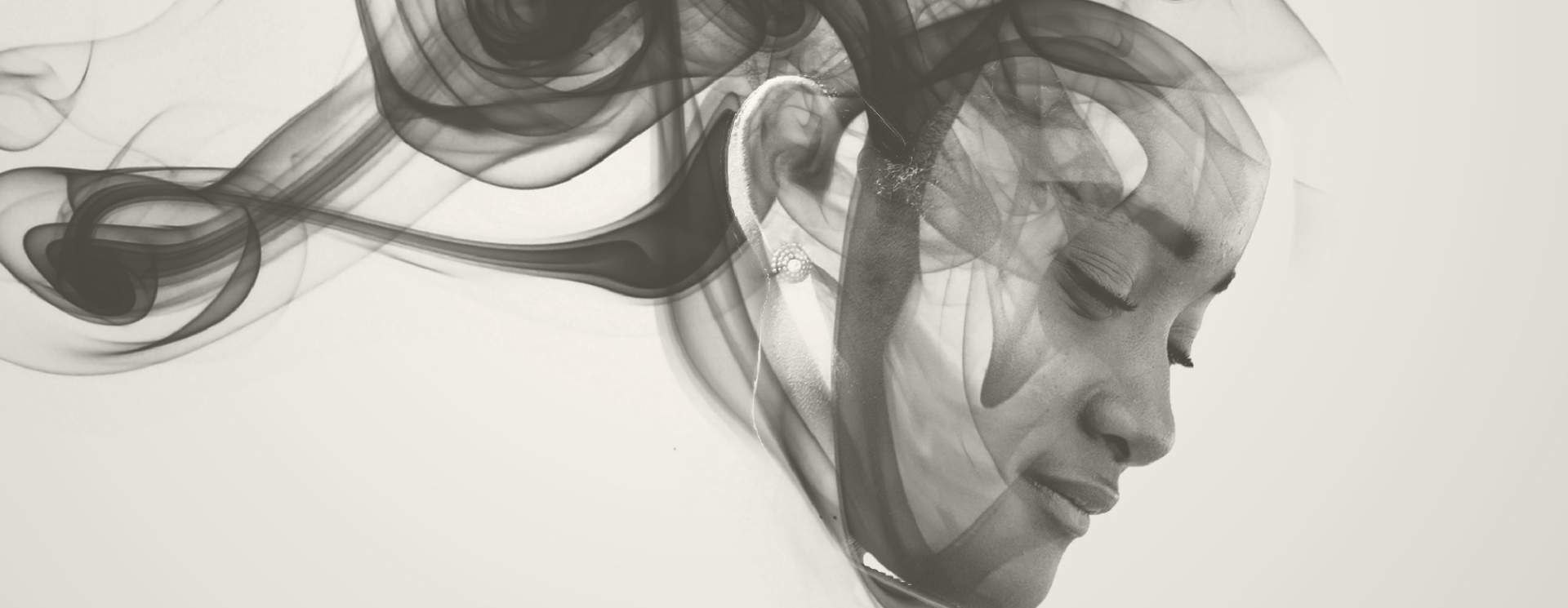 Abstract black and white design with flowing lines on a light background