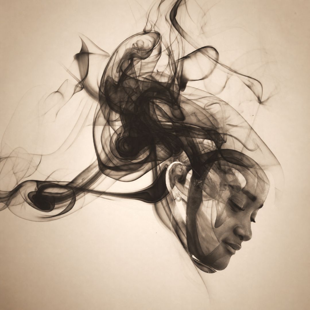 Artistic depiction of a woman's face with swirling smoke effects on a beige background