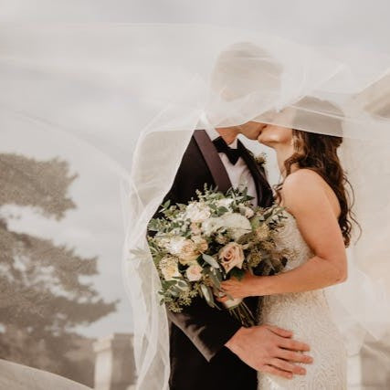 Bride and Groom kissing at their wedding